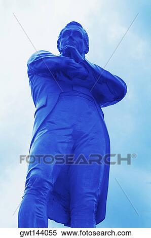 Low angle view of a statue, Raffles city, Singapore View Large Photo Image Stock Photography - Low angle view of a statue, Raffles city, Singapore. Fotosearch