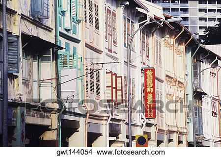Low angle view of buildings in a city, Singapore View Large Photo Image Picture - Low angle view of buildings in a city, Singapore. Fotosearch
