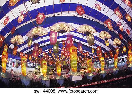 Low angle view of lanterns hanging on a ceiling in a temple, Singapore View Large Photo Image Stock Photo - Low angle view of lanterns hanging on a ceiling in a temple, Singapore. Fotosearch