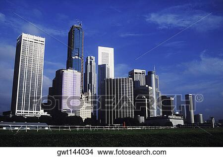 Picture - Low angle view of skyscrapers in a city, Singapore. Fotosearch