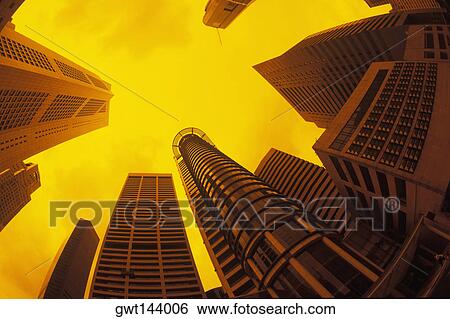 Low angle view of skyscrapers in a city, Singapore View Large Photo Image Stock Photograph - Low angle view of skyscrapers in a city, Singapore. Fotosearch