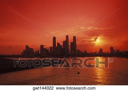 Silhouette of buildings at the waterfront, Singapore View Large Photo Image Stock Image - Silhouette of buildings at the waterfront, Singapore. Fotosearch