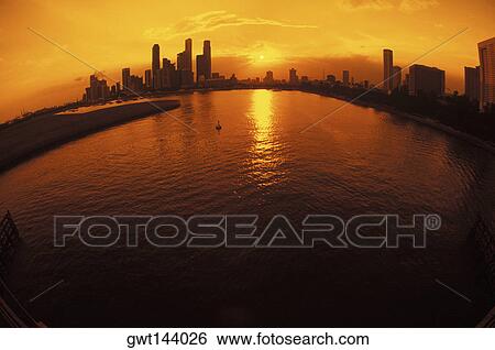 Silhouette of buildings at the waterfront, Singapore View Large Photo Image Stock Photograph - Silhouette of buildings at the waterfront, Singapore. Fotosearch