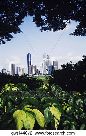 Stock Image - Skyscrapers in a city, Singapore. Fotosearch