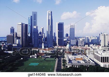 Skyscrapers in a city, Singapore View Large Photo Image Stock Photograph - Skyscrapers in a city, Singapore. Fotosearch