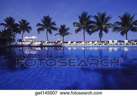 Lounge chair at the poolside View Large Photo Image Stock Photo - Lounge chair at the poolside. Fotosearch