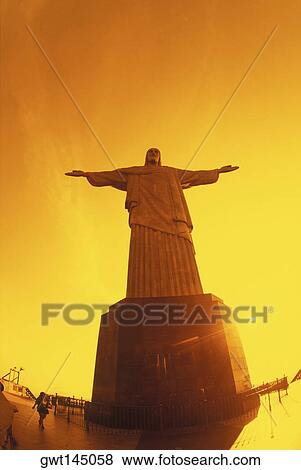 Stock Photo - Low angle view of a statue, Christ the Redeemer Statue, Rio De Janeiro, Brazil. Fotosearch