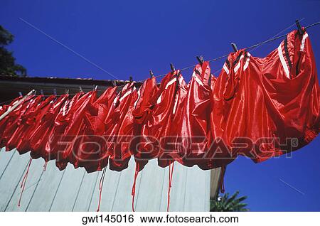 Low angle view of shorts hanging on a clothesline View Large Photo Image Stock Photograph - Low angle view of shorts hanging on a clothesline. Fotosearch