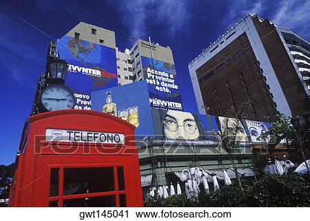 Telephone booth in front of buildings View Large Photo Image Stock Image - Telephone booth in front of buildings. Fotosearch