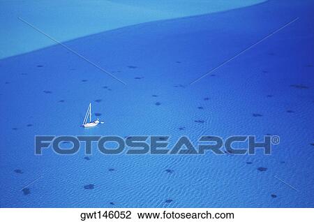Aerial view of a boat in the ocean, Hawaii, USA View Large Photo Image Stock Image - Aerial view of a boat in the ocean, Hawaii, USA. Fotosearch