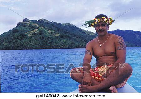 Close-up of a young man sitting on a ship's bow, Hawaii, USA View Large Photo Image Stock Image - Close-up of a young man sitting on a ship's bow, Hawaii, USA. Fotosearch