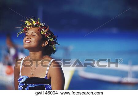 Close-up of a young woman wearing a laurel wreath, Hawaii, USA View Large Photo Image Picture - Close-up of a young woman wearing a laurel wreath, Hawaii, USA. Fotosearch