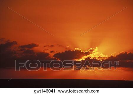 Clouds over the ocean at sunset, Hawaii, USA View Large Photo Image Stock Image - Clouds over the ocean at sunset, Hawaii, USA. Fotosearch