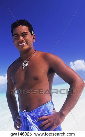Portrait of a young man standing with arms akimbo, Hawaii, USA View Large Photo Image Stock Photography - Portrait of a young man standing with arms akimbo, Hawaii, USA. Fotosearch