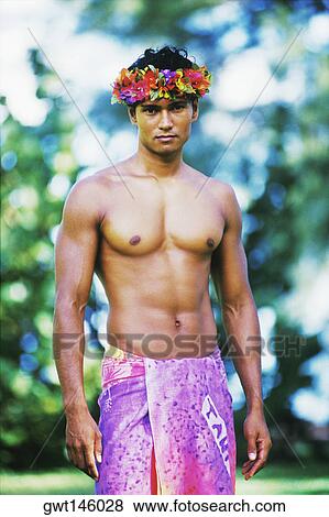 Portrait Of A Young Man Wearing A Sarong, Hawaii, Usa Stock Photo 