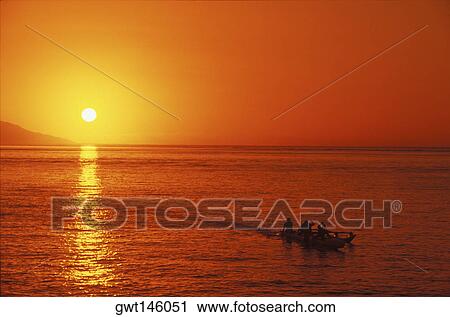 Silhouette of a group of people on a boat in the ocean, Hawaii, USA View Large Photo Image Stock Image - Silhouette of a group of people on a boat in the ocean, Hawaii, USA. Fotosearch