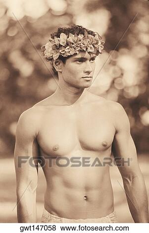 Close-up of a young man wearing a laurel wreath, Hawaii, USA View Large Photo Image Stock Photo - Close-up of a young man wearing a laurel wreath, Hawaii, USA. Fotosearch