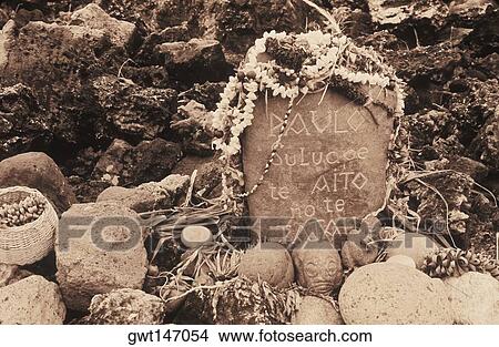 Picture - Close-up of text engraved on stone. Fotosearch