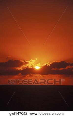 Sunset over the sea, Hawaii, USA View Large Photo Image Stock Image - Sunset over the sea, Hawaii, USA. Fotosearch