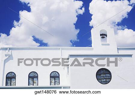 Stock Photograph - Clouds over a building, Texas, USA. Fotosearch