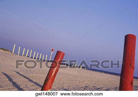 Wooden posts on the beach, Texas, USA View Large Photo Image Stock Photo - Wooden posts on the beach, Texas, USA. Fotosearch