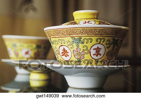 Close-up of bowls on the table View Large Photo Image Stock Photo - Close-up of bowls on the table. Fotosearch
