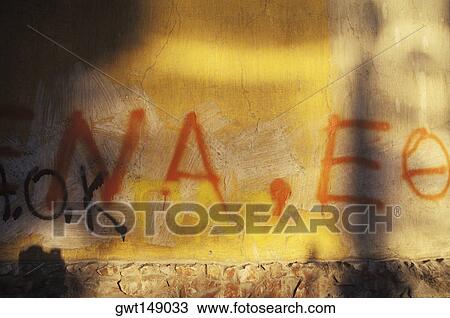 Close-up of text on the wall View Large Photo Image Stock Image - Close-up of text on the wall. Fotosearch