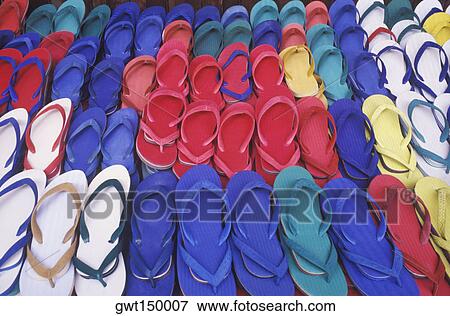 Close-up of flip-flops in a store View Large Photo Image Stock Photo - Close-up of flip-flops in a store. Fotosearch