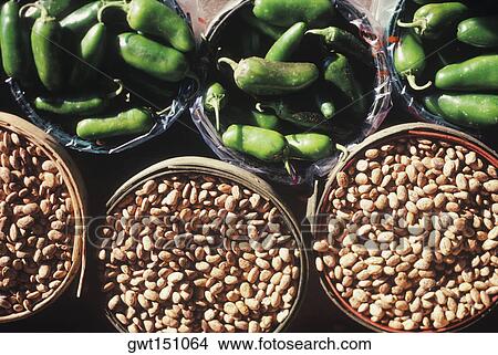 High angle view of peppers and beans in baskets View Large Photo Image Picture - High angle view of peppers and beans in baskets. Fotosearch