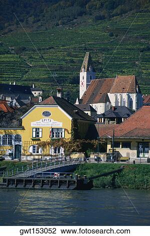 Dwellings in a village by the river, Danube River, Spitz, Austria View Large Photo Image Stock Image - Dwellings in a village by the river, Danube River, Spitz, Austria. Fotosearch