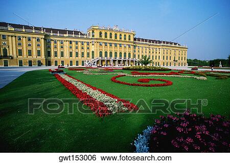 Stock Photograph - Garden in front of a palace, Schonbrunn Palace, Vienna, Austria. Fotosearch