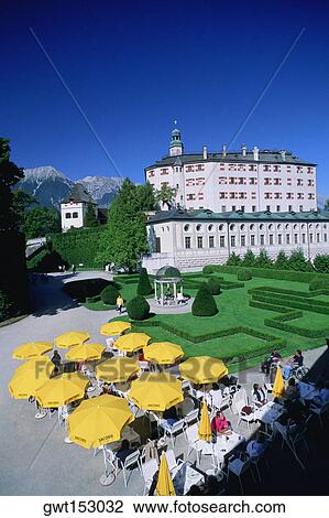 High angle view of a sidewalk cafe near a castle, Ambras Castle, Innsbruck, Austria View Large Photo Image Stock Image - High angle view of a sidewalk cafe near a castle, Ambras Castle, Innsbruck, Austria. Fotosearch