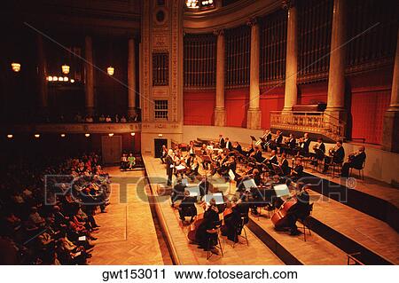 High angle view of musicians playing at a concert, Hofburg Concert Orchestra, Hofburg Palace, Vienna, Austria View Large Photo Image Stock Image - High angle view of musicians playing at a concert, Hofburg Concert Orchestra, Hofburg Palace, Vienna, Austria. Fotosearch