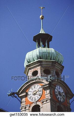 Low angle view of a clock tower, Innsbruck, Austria View Large Photo Image Stock Photography - Low angle view of a clock tower, Innsbruck, Austria. Fotosearch
