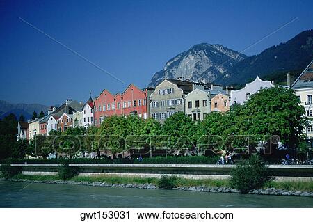 Row houses along a river, Inn River, Innsbruck, Austria View Large Photo Image Stock Image - Row houses along a river, Inn River, Innsbruck, Austria. Fotosearch