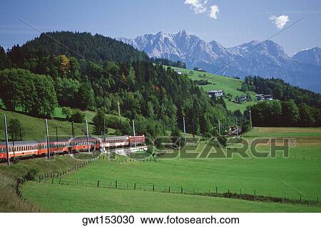 Train passing through a hillside, Innsbruck, Austria View Large Photo Image Stock Image - Train passing through a hillside, Innsbruck, Austria. Fotosearch
