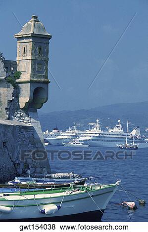 Boat anchored near an old ruined building, Elba, Italy View Large Photo Image Stock Photo - Boat anchored near an old ruined building, Elba, Italy. Fotosearch