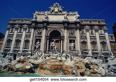 Fountain in front of a building, Trevi Fountain, Rome, Italy View Large Photo Image Picture - Fountain in front of a building, Trevi Fountain, Rome, Italy. Fotosearch