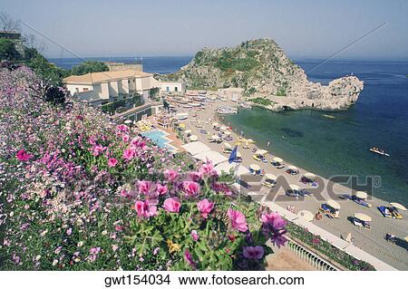 High angle view of beach umbrellas, Mazzaro Beach, Taormina, Sicily, Italy View Large Photo Image Picture - High angle view of beach umbrellas, Mazzaro Beach, Taormina, Sicily, Italy. Fotosearch
