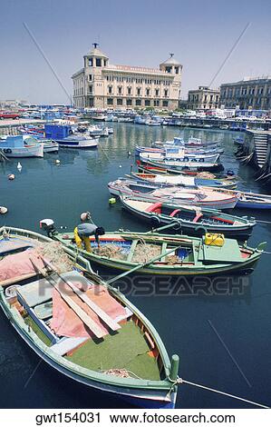 High angle view of boats moored at a harbor, Siracusa, Sicily, Italy View Large Photo Image Stock Image - High angle view of boats moored at a harbor, Siracusa, Sicily, Italy. Fotosearch