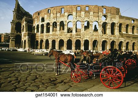 Horse drawn carriage in front of a colosseum, Rome, Italy View Large Photo Image Stock Image - Horse drawn carriage in front of a colosseum, Rome, Italy. Fotosearch