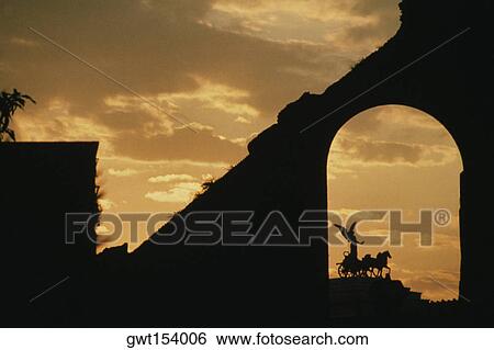 Silhouette of a statue, Vittorio Emanuele Monument, Rome, Italy View Large Photo Image Stock Photograph - Silhouette of a statue, Vittorio Emanuele Monument, Rome, Italy. Fotosearch