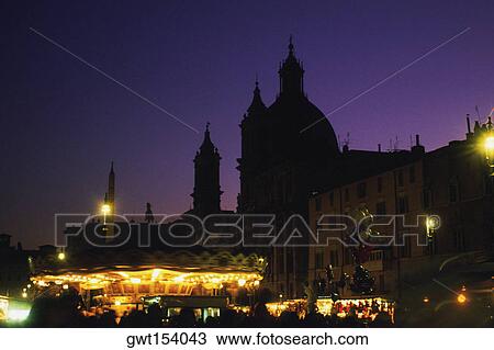 Silhouette of buildings lit up at night, Rome, Italy View Large Photo Image Stock Image - Silhouette of buildings lit up at night, Rome, Italy. Fotosearch