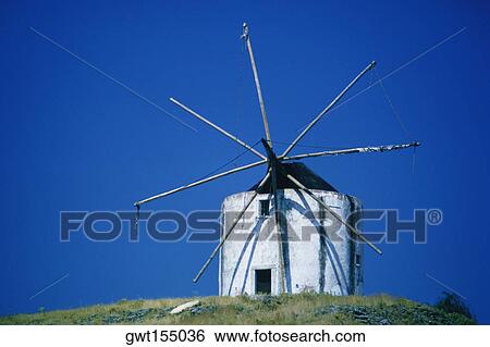 Stock Photograph - Industrial windmill on a landscape, Portugal. Fotosearch