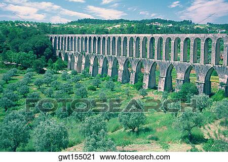 Stock Image - Roman aqueduct on a landscape, Tomar, Santarem, Portugal. Fotosearch