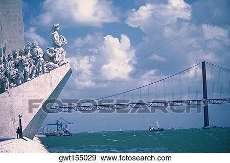 Statues in front of a bridge, Monument to the Discoveries, Belem, Lisbon, Portugal View Large Photo Image Stock Photo - Statues in front of a bridge, Monument to the Discoveries, Belem, Lisbon, Portugal. Fotosearch