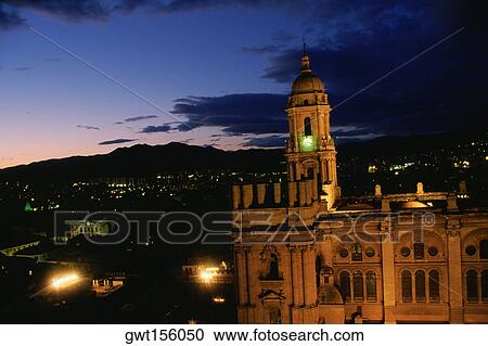 Stock Image - Cathedral lit up at night, Malaga, Andalusia, Spain. Fotosearch