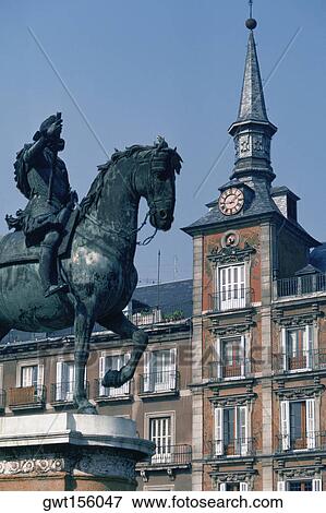Low angle view of a statue in front of a building, Statue Of Philip III, Madrid, Spain View Large Photo Image Stock Photo - Low angle view of a statue in front of a building, Statue Of Philip III, Madrid, Spain. Fotosearch