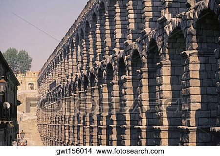 Low angle view of an aqueduct, Segovia, Spain View Large Photo Image Picture - Low angle view of an aqueduct, Segovia, Spain. Fotosearch