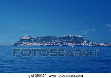 Rock formations at the waterfront, Rock of Gibraltar, Gibraltar, Spain View Large Photo Image Picture - Rock formations at the waterfront, Rock of Gibraltar, Gibraltar, Spain. Fotosearch